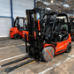 AutoSock AF traction device mounted on front wheels of a forklift